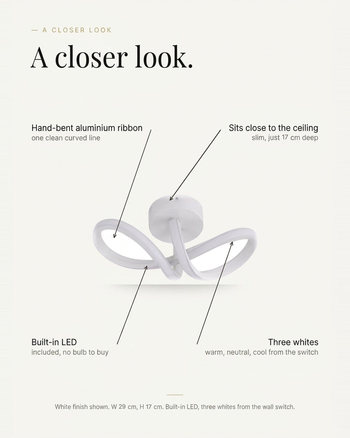 A closer look at the curved ribbon LED ceiling light: hand-bent aluminium ribbon, sits 17 cm deep, built-in LED with three whites from the wall switch