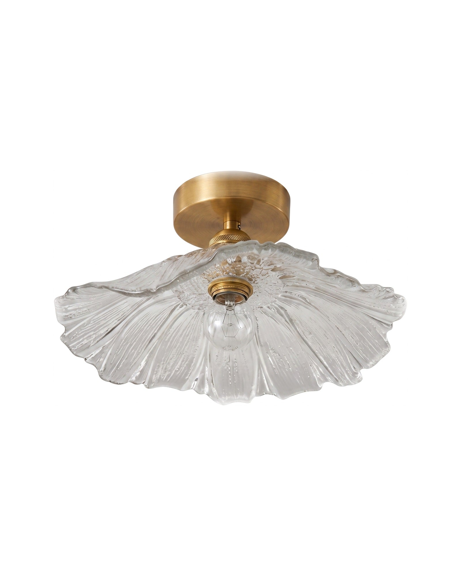 Antique brass semi-flush fluted glass ceiling light on a white background