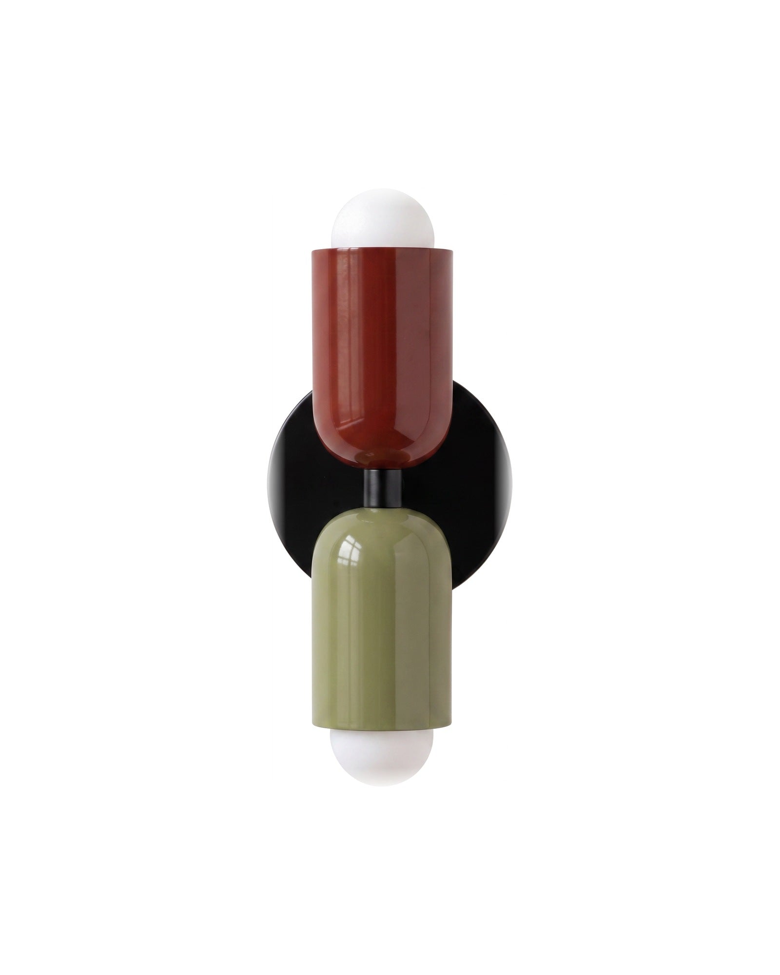 Up-and-down wall light, red top shade, green bottom shade, black backplate, on a white background