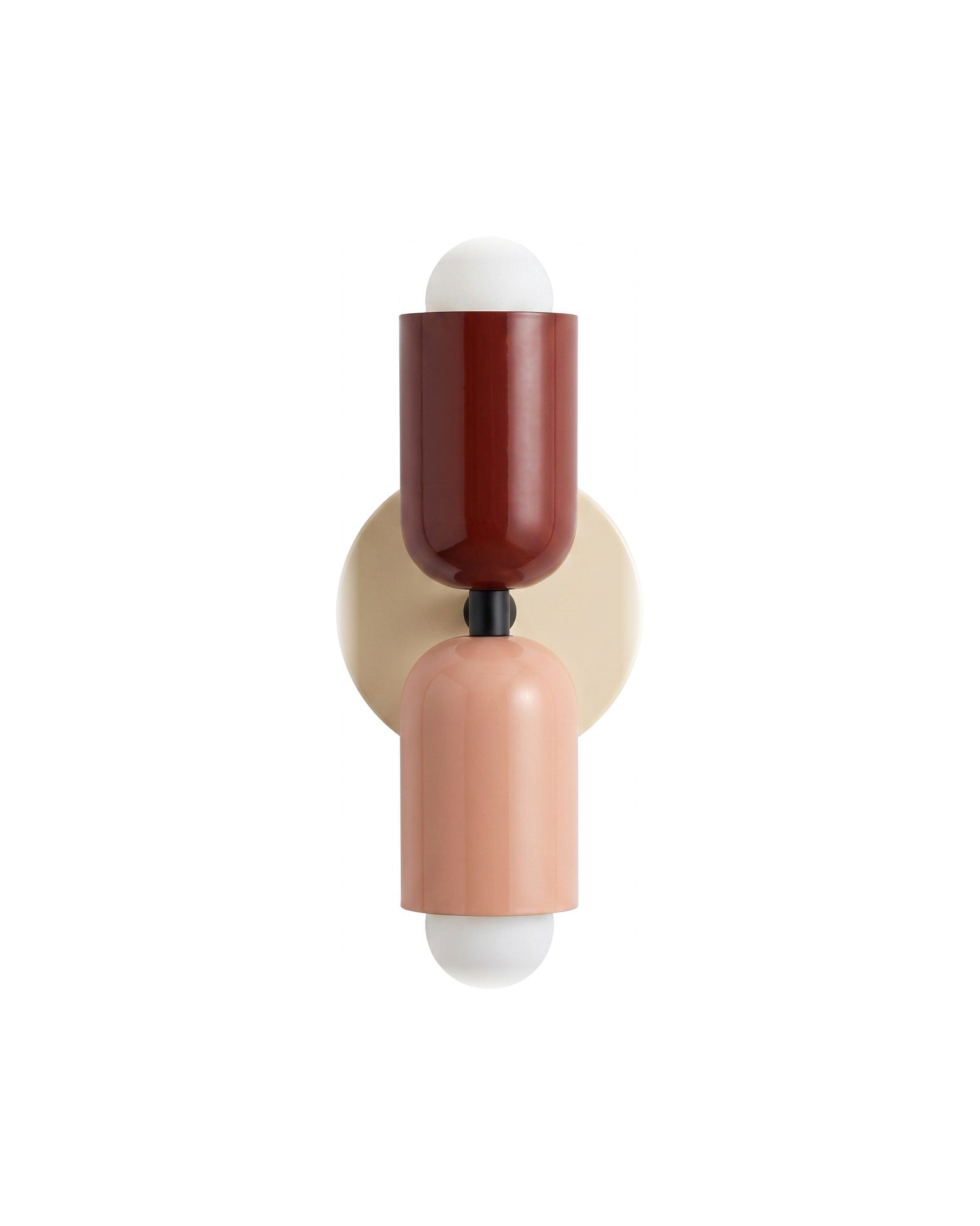 Up-and-down wall light, red top shade, pink bottom shade, cream backplate, on a white background