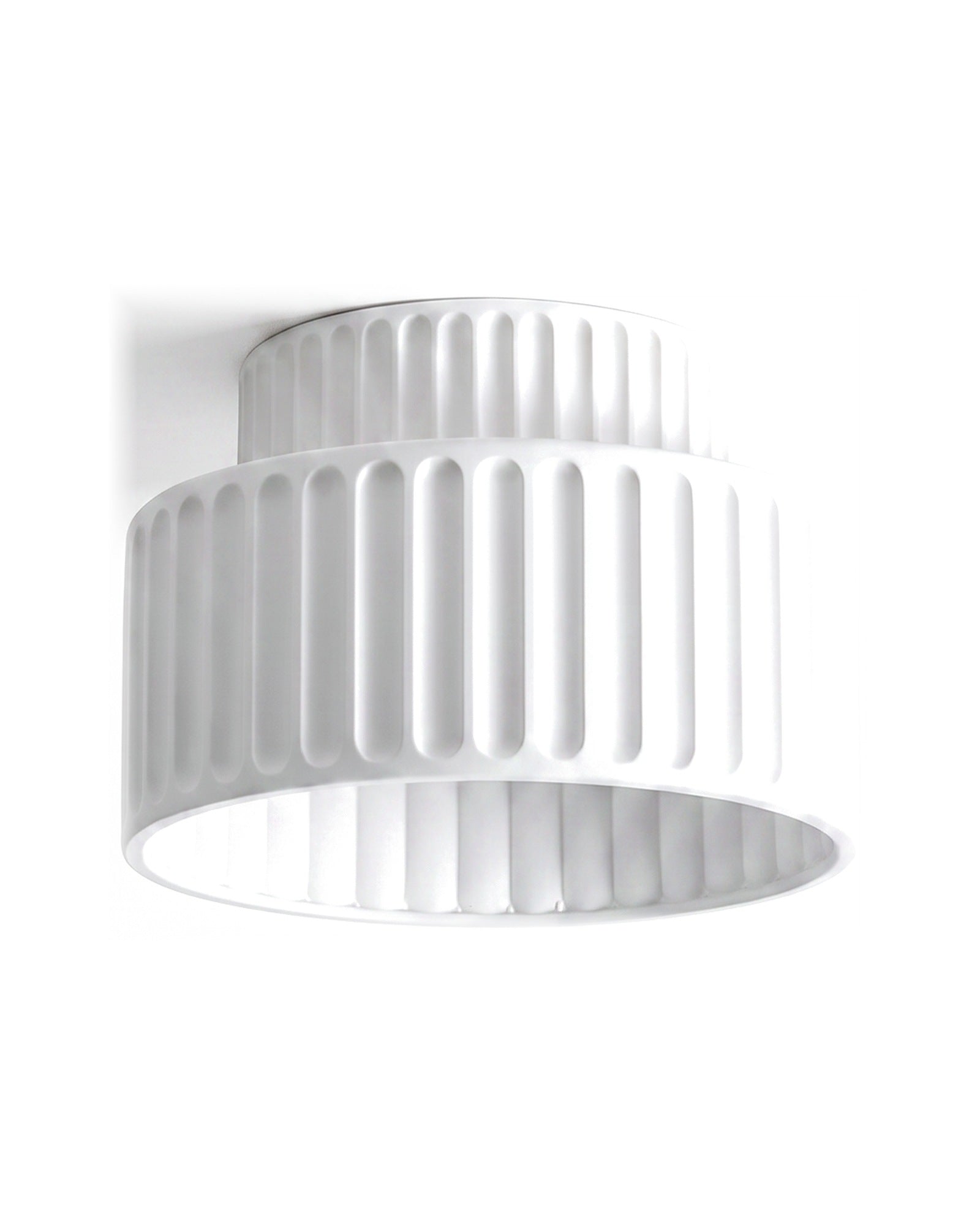 White pleated bowl flush mount ceiling light on a white background