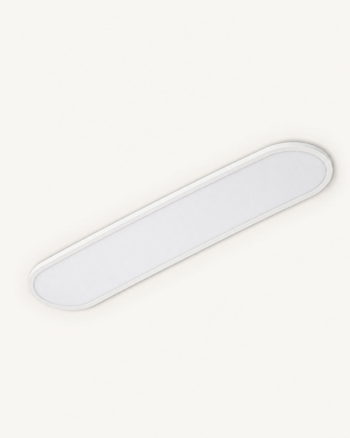 White ultra-thin capsule LED ceiling light on a plain off-white background