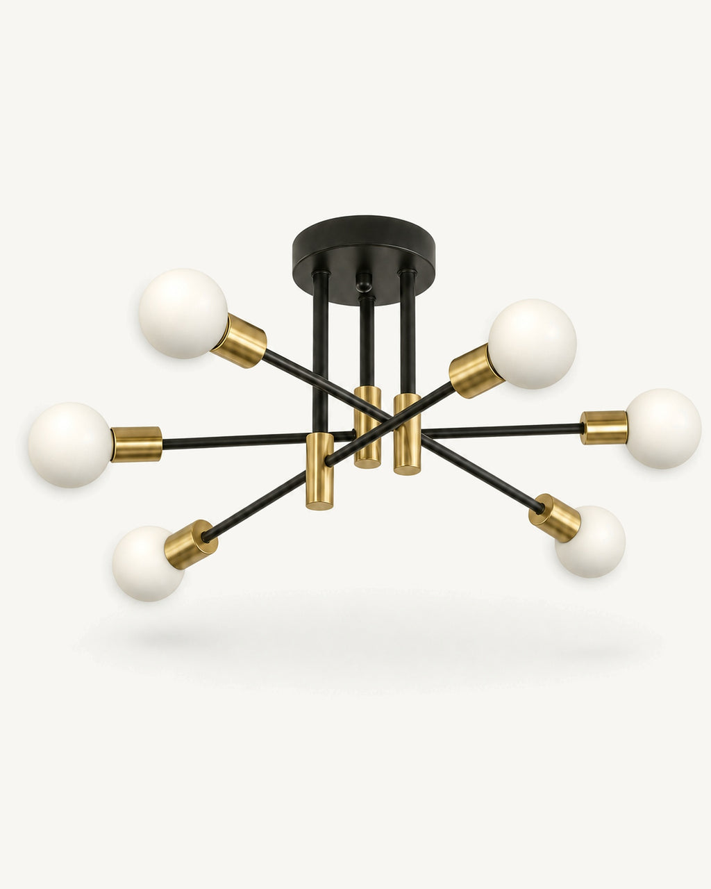Nordic sputnik 6-light semi-flush ceiling light in black and gold, six frosted white globe bulbs on staggered black arms with brushed-gold sockets, on a pale studio background