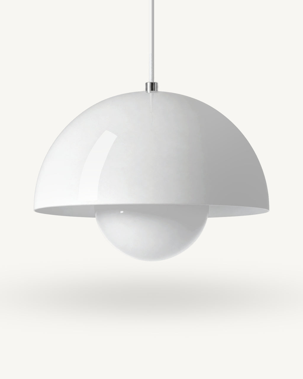 Modern iron dome pendant light in White, its painted metal sphere sitting level with the shade rim