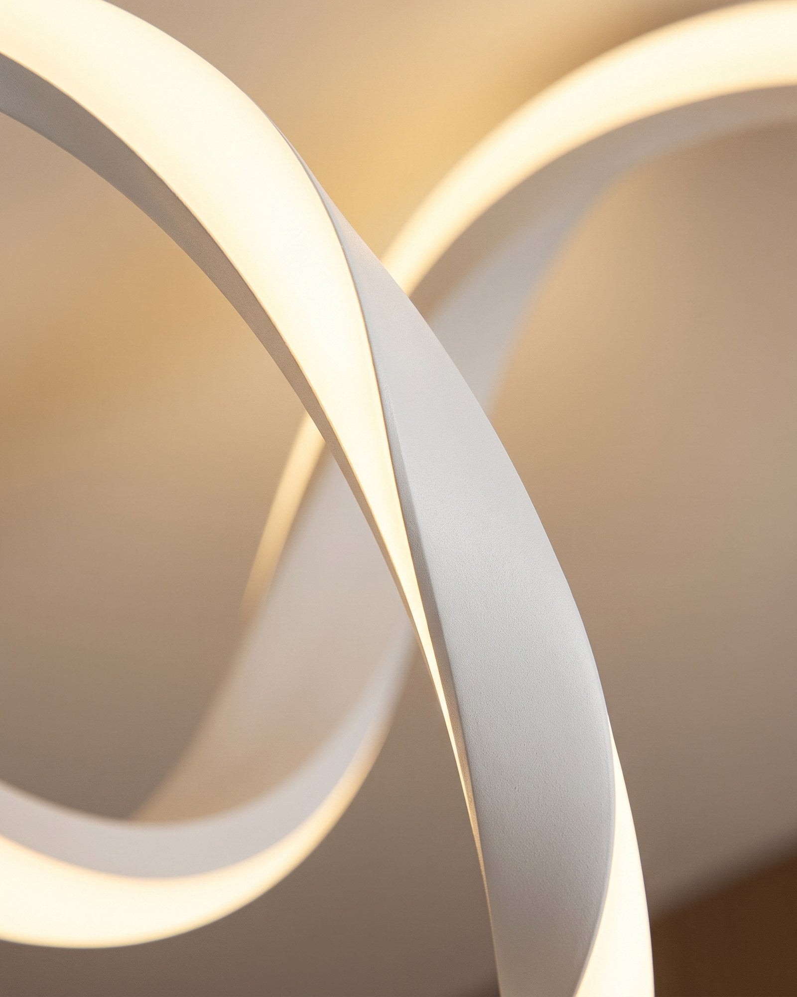 Macro of the hand-bent aluminium ribbon and its soft glowing diffuser