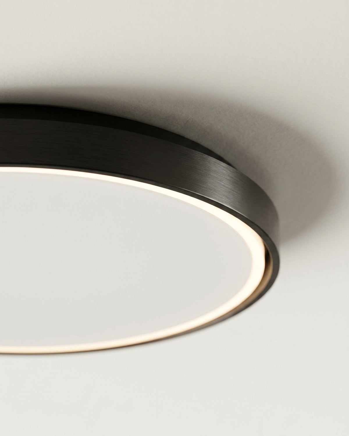 Built-in light. Sits close to the ceiling.