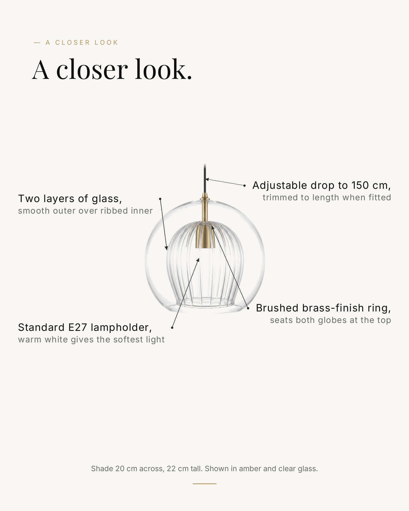 A closer look at the Zoey: two layers of glass, brushed brass-finish ring, E27 lampholder, adjustable drop to 150 cm